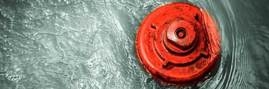 red hydrant in water