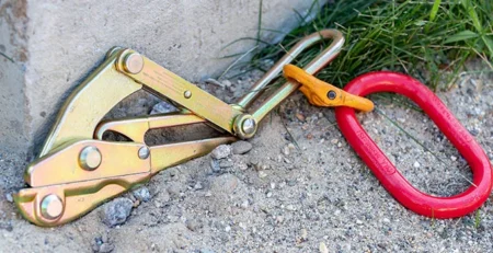 NCT cable grab and oval link shown on the ground at work site