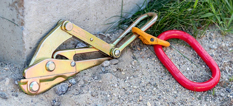 NCT cable grab and oval link shown on the ground at work site